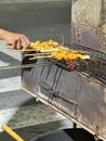 Grilled squid on a charcoal grill. Thai street food Royalty Free Stock Photo