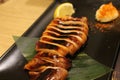 Grilled squid or fish or seafood served at izakaya in Beppu