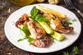 Grilled squid with lemon and zucchini Royalty Free Stock Photo