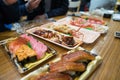 Grilled Squid, and others sushi; salmon, otoro, eel, grilled shrimp, crab are arranged on the table ready to eat Royalty Free Stock Photo