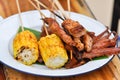 Grilled squid, grilled pork and grilled corn