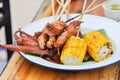 Grilled squid, grilled pork and grilled corn