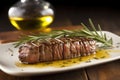 grilled steak basted with a rosemary oil brush
