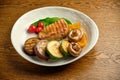 Grilled steak with champignons Royalty Free Stock Photo