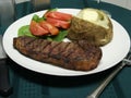 Grilled Steak dinner with utensils Royalty Free Stock Photo