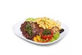 Grilled steak with french fries and vegetables on Royalty Free Stock Photo