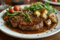 Grilled steak meal with potatoes and salad on a plate