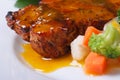 Grilled steak meat with sauce and vegetable Royalty Free Stock Photo