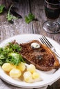 Grilled steak with potatoes Royalty Free Stock Photo