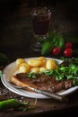 Grilled steak with potatoes Royalty Free Stock Photo