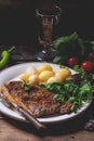 Grilled steak with potatoes Royalty Free Stock Photo