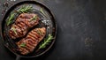 Grilled steak with rosemary on a cast iron skillet Royalty Free Stock Photo
