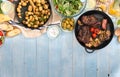 grilled steak, vegetables, potatoes, salad, snacks, homemade lemonade with border Royalty Free Stock Photo