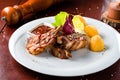 Grilled steaks, baked potatoes and vegetable salad Royalty Free Stock Photo