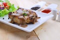 Grilled steaks, pork with pepper gravy and vegetable salad