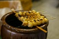 Grilled Sticky Rice Ball in street kiosk. Traditional Japanese food Mochi Royalty Free Stock Photo