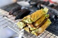Grilled Sticky Rice in Banana Leaf on Stove Selective Focus Royalty Free Stock Photo
