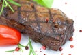 Grilled strip steak with tomato and salad