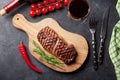 Grilled striploin steak and red wine Royalty Free Stock Photo