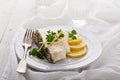 Grilled stripped bass with lemon and herbs