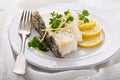 Grilled stripped bass with lemon and herbs