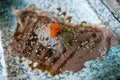 Grilled sushi wagyu beef with shoyu sauce on top with ebiko shrimp eggs and white sesame Royalty Free Stock Photo