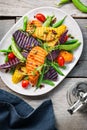 Grilled Sweet Potatoes with Snap pea and Rocket Salad Royalty Free Stock Photo