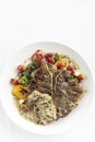 Grilled t-bone steak with peppercorn sauce and vegetables Royalty Free Stock Photo