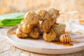 Grilled Thai meat ball with spicy sauce, selective focus