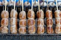 Grilled Thai sausage at street food market in Thailand, closeup. Traditional Thai sausage with pork and rice, delicious street Royalty Free Stock Photo