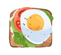 Grilled toast with fried egg, tomato slice, lettuce leaf and cream cheese on bread. Sandwich top view. Healthy snack Royalty Free Stock Photo