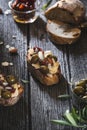 Grilled Toast with Goat Cheese, Dried Tomato, Green Olive and Almond for Brunch Royalty Free Stock Photo