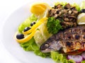 Grilled trout with lime and salad Royalty Free Stock Photo