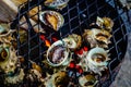 Grilled turban shells in seafood shop near Seopjikoji