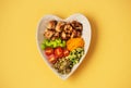 Grilled turkey fillet, avocado, fresh vegetables and sprouts with olive oil, top view. Buddha bowl Balanced healthy diet.