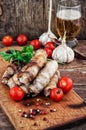 Grilled Turkey sausages with beer Royalty Free Stock Photo