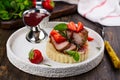 Grilled veal steak with couscous and strawberry sauce Royalty Free Stock Photo