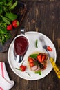 Grilled veal steak with couscous and strawberry sauce Royalty Free Stock Photo