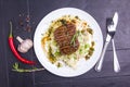 Grilled veal steak with vegetables on a plate Royalty Free Stock Photo