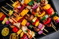 Grilled vegetable and chicken skewers on a grill pan, top view Royalty Free Stock Photo