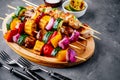 Grilled vegetable and chicken skewers with sweet corn, paprika, zucchini, onion, tomato and mushroom
