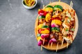 Grilled vegetable and chicken skewers with sweet corn, paprika, zucchini, onion, tomato and mushroom