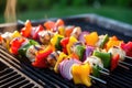 grilled vegetable kabobs with bell peppers and onions on bbq Royalty Free Stock Photo