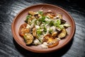 Grilled vegetable salad. Salad of barbecued zucchini, eggplant, onion.