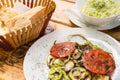 Grilled vegetables and cabbage salad, bread on a wooden table. The concept of healthy eating. Close-up. Royalty Free Stock Photo