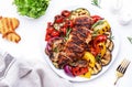 Grilled vegetables and chicken breast fillet. Colorful paprika, zucchini, eggplant, mushrooms, tomatoes, onion and rosemary, Royalty Free Stock Photo