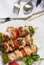 Grilled vegetables with chicken kebabs top view Royalty Free Stock Photo