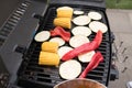 Grilled vegetables: corn, eggplant, and red peppers on barbecue grill Royalty Free Stock Photo