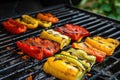 Grilled vegetables on a grill, red pepper and yellow pepper, zucchini Royalty Free Stock Photo