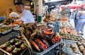 Grilled vegetables, stuffed eggplantand, local street snacks on stall of traditional farm market